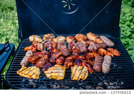 grilled meat over the coals on barbecue grilled meat over the coals on barbecue 137436818