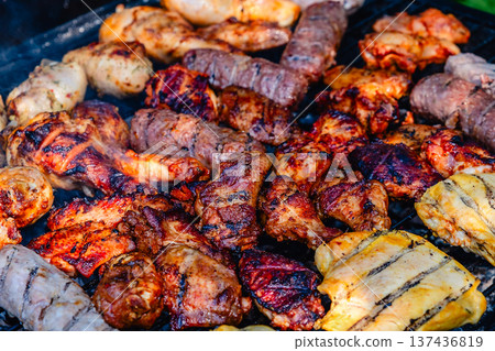 grilled meat over the coals on barbecue grilled meat over the coals on barbecue 137436819