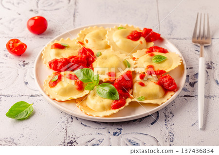 Ravioli with tomato sauce and basil Ravioli with tomato sauce and basil 137436834