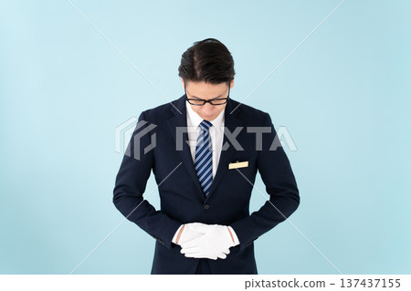 Businessman white gloves bowing 137437155