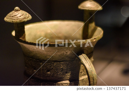 Ancient Chinese bronze vessel (Ding) exhibited in Luoyang museum in Henan province, China Ancient Chinese bronze vessel (Ding) exhibited in Luoyang museum in Henan province, China 137437171