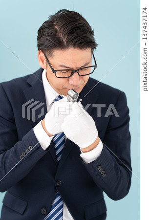 A man giving an appraisal A man giving an appraisal 137437174
