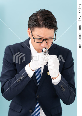 A man giving an appraisal A man giving an appraisal 137437175