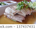 Close up of Singaporean poached chicken garnished 137437431