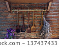 Vintage kitchen decoration with wooden tools and brick 137437433