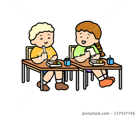 Two children having lunch together in the classroom 137437748