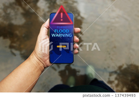 Flash flood alert on Smartphone in Rainy day, Climate change 137439493