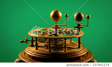 Detailed antique orrery, a mechanical model of the solar system, showcasing celestial bodies and gears. 137441174