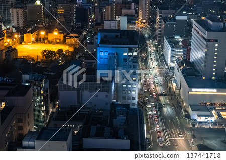 Busy roads and buildings at night on the old National Route 1 (old Tokaido) in front of Shizuoka Station 137441718