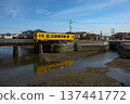 Shimabara Railway local line at low tide 137441772