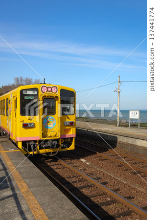 Local line at Daisanto Station with ocean views 137441774