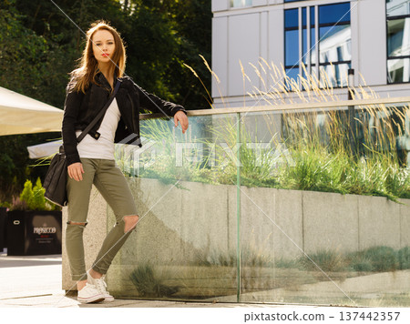 Fashion model outdoor in modern city Fashion model outdoor in modern city 137442357