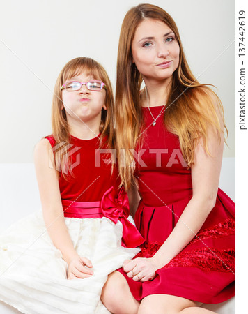 Mommy and daughter having fun Mommy and daughter having fun 137442619