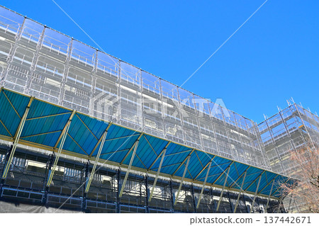 Urban landscape with an apartment building site under construction Urban landscape with an apartment building site under construction 137442671