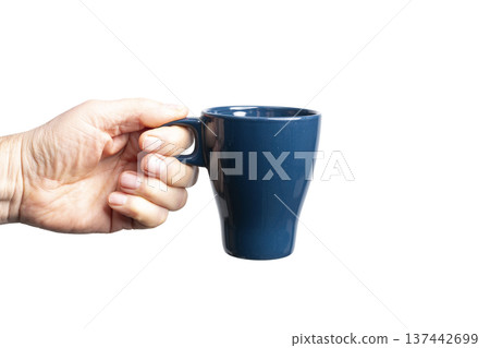 a blue cup in hand a blue cup in hand 137442699