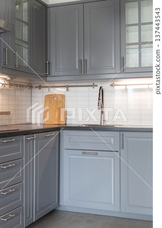 Modern grey kitchen interior close-up corner Modern grey kitchen interior close-up corner 137443543