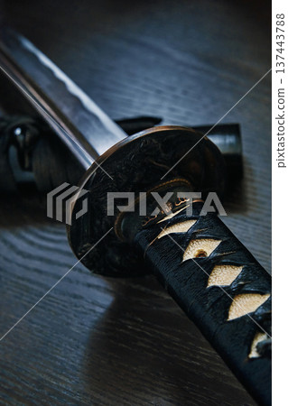 Japanese black katana sword close-up Japanese black katana sword close-up 137443788