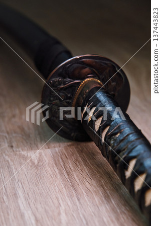 Japanese black katana sword close-up Japanese black katana sword close-up 137443823