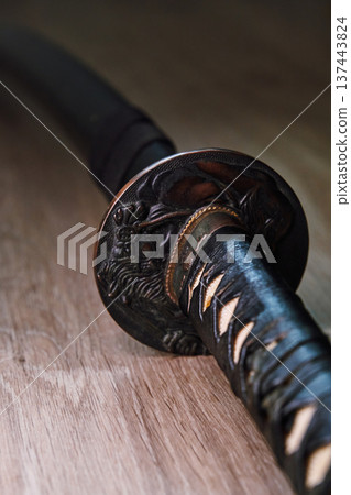 Japanese black katana sword close-up Japanese black katana sword close-up 137443824