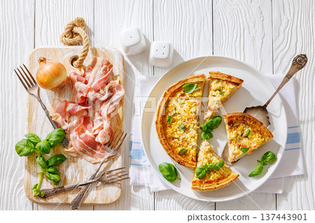 Quiche Lorraine on a white plate, top view Quiche Lorraine on a white plate, top view 137443901