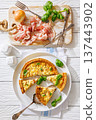 Quiche Lorraine on a white plate, top view 137443902