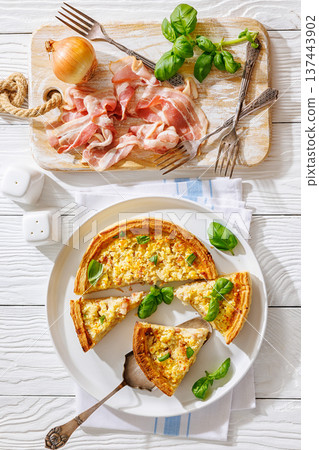Quiche Lorraine on a white plate, top view Quiche Lorraine on a white plate, top view 137443902