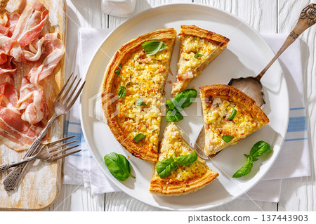Quiche Lorraine on a white plate, top view Quiche Lorraine on a white plate, top view 137443903