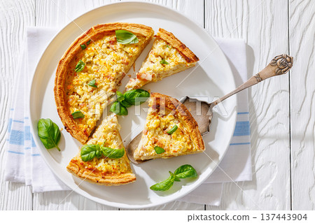 Quiche Lorraine on a white plate, top view Quiche Lorraine on a white plate, top view 137443904