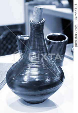 Model printed on 3D printer from metal. Object created on 3D printer from melting metal thread. Modern new technologies. Additive progressive manufacturing solution. Metal 3d printing technology Model printed on 3D printer from metal. Object created on 3D printer from melting metal thread. Modern new technologies. Additive progressive manufacturing solution. Metal 3d printing technology 137444191