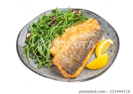 Pan fried whitefish fillets plated with fresh green salad, gourmet mediterranean cuisine presentation photographed from above. Pan fried whitefish fillets plated with fresh green salad, gourmet mediterranean cuisine presentation photographed from above. 137444719