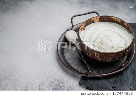 Mascarpone Italian cream cheese in wooden bowl. white background. top view 137444838