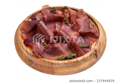 Cecina meat slices, spanish beef jamon on wooden tray isolated on white background. top view 137444839