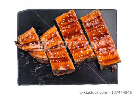 Unagi kabayaki eel, japanese grilled fish fillet with sauce isolated on white background. top view 137444846