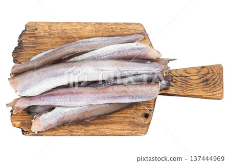 Minimal seafood styling with raw blue whiting fish on isolated background, fresh marine ingredient ready for preparation and healthy diet ideas Minimal seafood styling with raw blue whiting fish on isolated background, fresh marine ingredient ready for preparation and healthy diet ideas 137444969