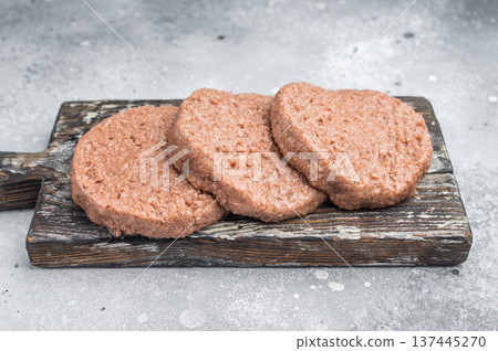 Vegetarian plant based burger patties meat substitute high protein cruelty free food clean top view background Vegetarian plant based burger patties meat substitute high protein cruelty free food clean top view background 137445270