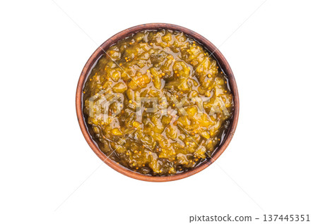 Green pickle relish made from cucumbers served in wooden bowl isolated on white background classic condiment and sauce Green pickle relish made from cucumbers served in wooden bowl isolated on white background classic condiment and sauce 137445351
