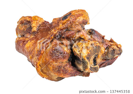 Roasted pork knuckle Schweinshaxe showing golden crackling rind, gelatin breakdown, browned protein texture and bone in structure in closeup. 137445358