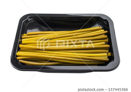 Pickled ramsons stems in black plastic container top view wild garlic ingredient isolated on light background minimal food concept 137445366