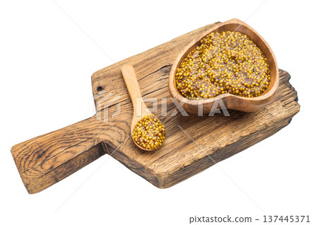 Traditional Dijon mustard condiment with seeds wooden bowl and spoon herbs flat lay on light isolated background Traditional Dijon mustard condiment with seeds wooden bowl and spoon herbs flat lay on light isolated background 137445371