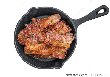 Crispy sizzling bacon with glossy roasted surface served in a black castiron pan on light background creating clean gourmet look. Crispy sizzling bacon with glossy roasted surface served in a black castiron pan on light background creating clean gourmet look. 137445383