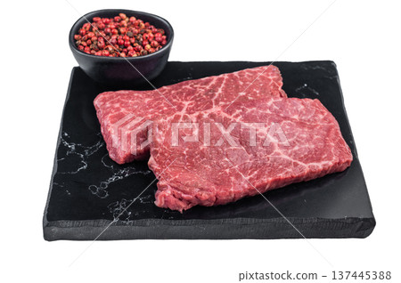 Fresh raw wagyu beef top side steak with natural marbling. Clean white background premium meat ingredient for culinary concepts. 137445388