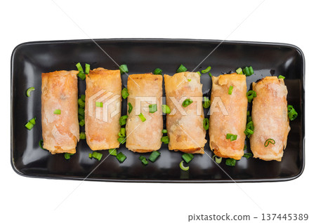 Fried spring rolls Lumpia finger food with scallions minimal Asian cuisine overhead shot Fried spring rolls Lumpia finger food with scallions minimal Asian cuisine overhead shot 137445389