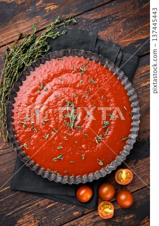 Tomato paste sauce with thyme in plate, canned food for cookng. wooden background. top view 137445443