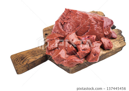 Whole and sliced lamb liver on wooden board, raw sheep organ meat, healthy protein ingredient for recipes and food design 137445456