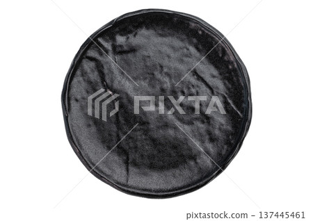 Empty black ceramic plate on light textured stone background. Minimal food mockup with copy space for menu design and branding.. 137445461