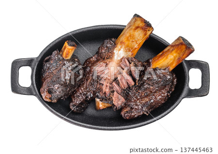 Braised beef ribs with pulled texture and caramelized surface in skillet. Slow cooked beef ribs with plate and back ribs appearance. Braised beef ribs with pulled texture and caramelized surface in skillet. Slow cooked beef ribs with plate and back ribs appearance. 137445463