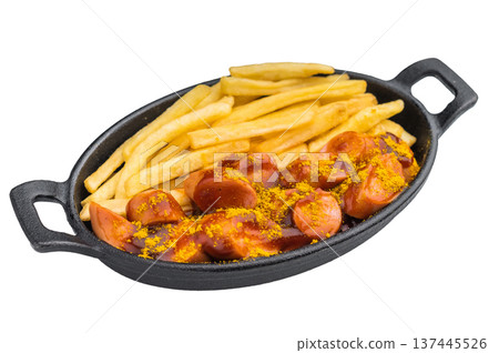 German currywurst with fries in a cast iron pan on white background ideal for street food visuals fast food ads and stock photography. German currywurst with fries in a cast iron pan on white background ideal for street food visuals fast food ads and stock photography. 137445526