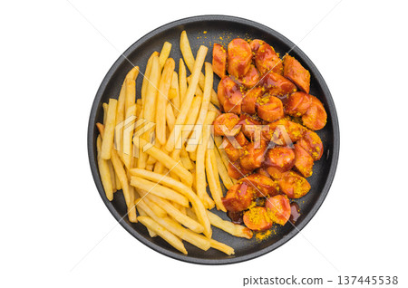 Currywurst Hot sausage with curry ketchup and golden fries on black dish suitable for fast food ads takeaway visuals and premium stock imagery. Currywurst Hot sausage with curry ketchup and golden fries on black dish suitable for fast food ads takeaway visuals and premium stock imagery. 137445538