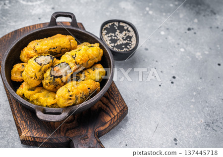 Korean Crispy seaweed noodle rolls Gimmari deep-fried seaweed rice rolls. grey background. top view Korean Crispy seaweed noodle rolls Gimmari deep-fried seaweed rice rolls. grey background. top view 137445718
