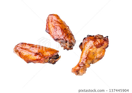 Deliciously sticky teriyakis sauce chicken wings, bursting with flavor, perfect for sharing at festive occasions or family dinners. isolated on white background. top view 137445904